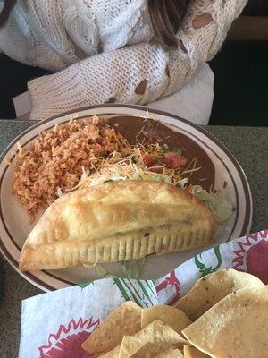 Lunch 8" taco, beef, with rice. Paid extra for beans.