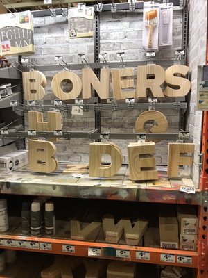 There are wooden letters in the paint department