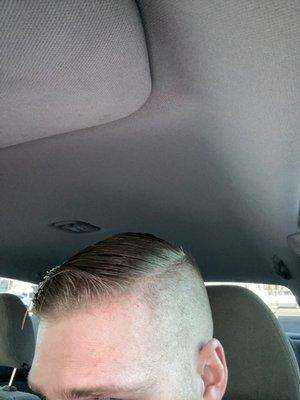 Haircut medium skin fade keep the hair on top.