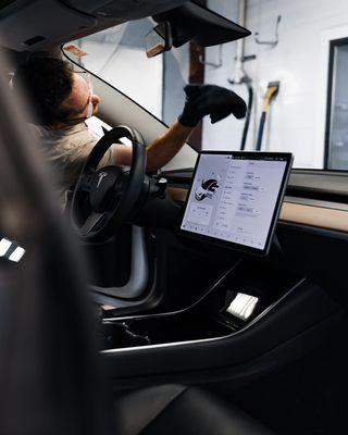 Tesla window cleaning