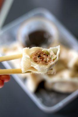 Inside of Steamed Dumplings 水饺 (6 pieces) ($6.99) - pork inside tastes stinky :(