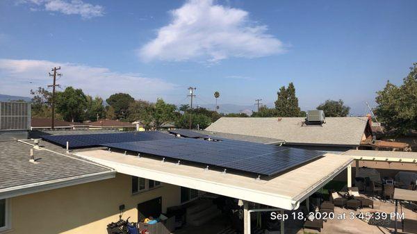 Solar panel installed over asphalt shingle roof for a residential home.