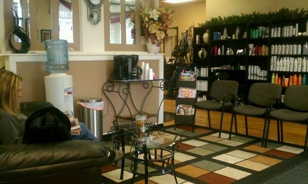 Nice waiting area and fully stocked retail (with purses too!!)