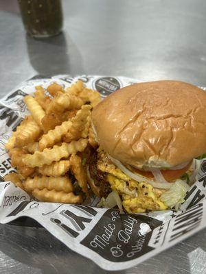 Cheese Burger topped with a delicious fried egg, Loaded with burger veggies, and Mustard