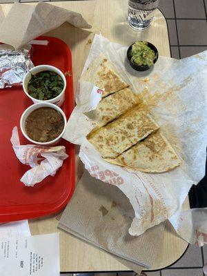 Birria quesadilla and side of beans.