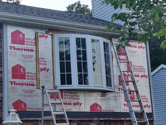 Bay window being installed.