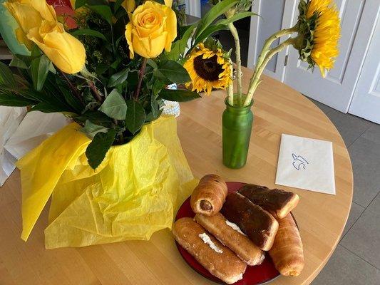 Flowers and donuts, the perfect birthday breakfast treat.