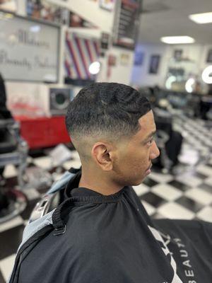 Mid bald fade wave length on top