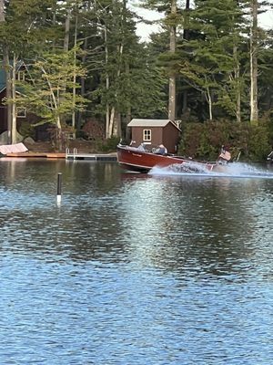 Wooden Boat taking morning run