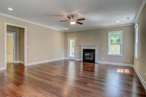 Hardwood flooring installation. Tarin Woods Home in Wilmington, NC