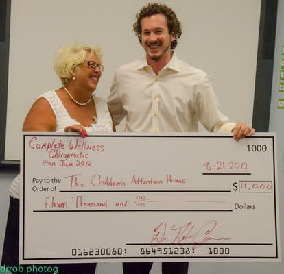 Dr. Cynowa with Janet Knight Handing over funds raised for the Children's Attention Home