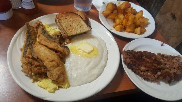 Fish & Grits w/rye toast  Sides of home fries & corned beef hash