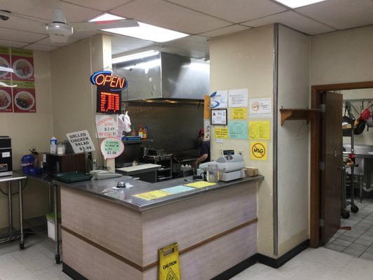 Front counter, grill behind.