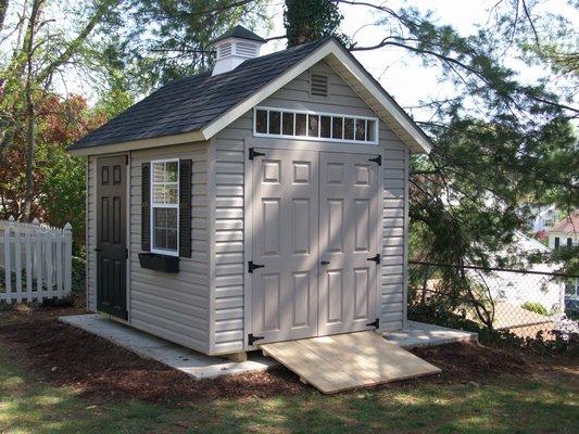 8x12 Chalet with Gray vinyl siding, optional transom window and cupola