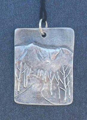 Silver pendant of Katahdin from the Golden Road by Suzanne Savage Brewer