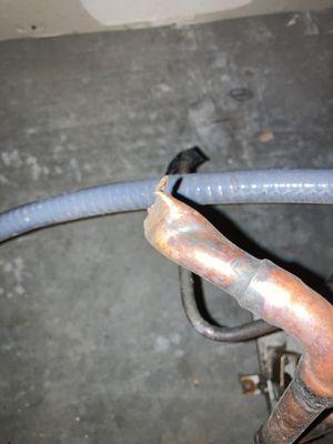 Copper tubing clipped and crimped improperly