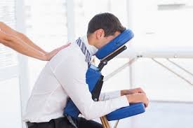 chair massage at the corporate office to ease off neck tension from working at the desk and relief pain and stress.