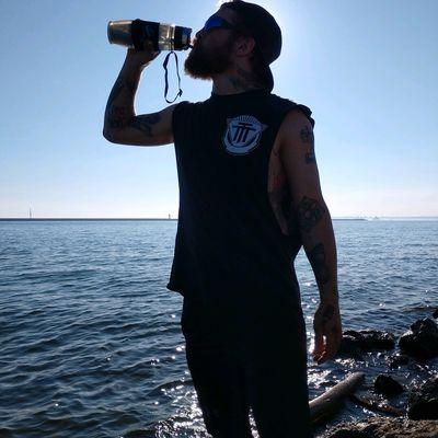 Bryan from the band "Something Better" enjoying Clean Water from Lake Erie and the AlexapureGo!