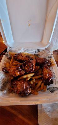 Chili tai wings and fries.