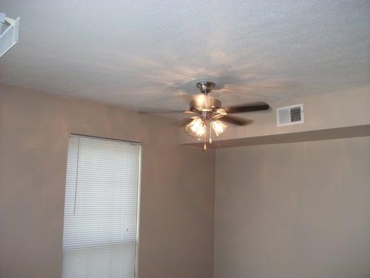 New light fixtures ceiling fans in dinning rooms.