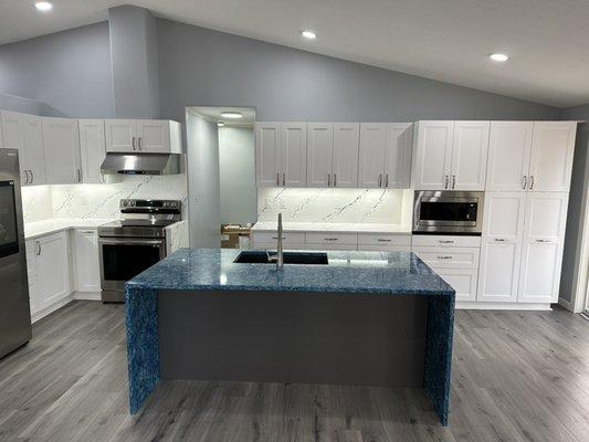 The waterfall countertop, really tired this kitchen together.