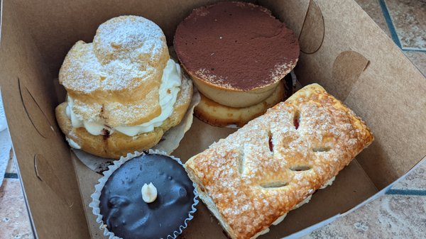 Cream puff, tiramisu whoopie pie, peanut butter/chocolate/graham cracker cake, raspberry cream pastry.