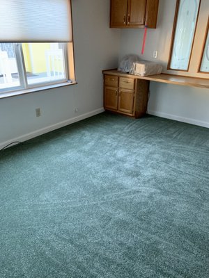 New carpeting and baseboard the night of installation day