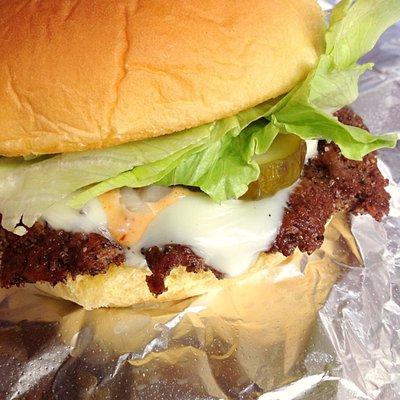 Mission Control Burger with Cheese, Rocket Sauce, Raw Onions, and Rocket-Made Sweet & Spicy Pickles