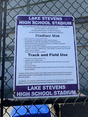 Stadium/track and field usage sign.