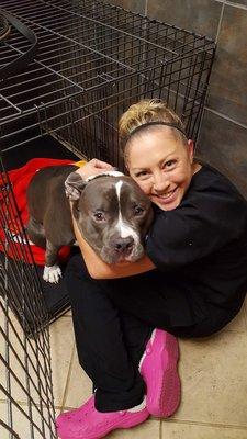 Our Veterinary Technician Kelly giving extra hugs to a patient after her spay surgery