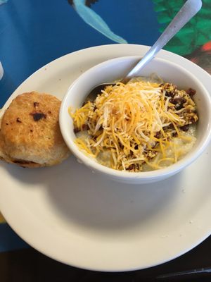 Breakfast bowl. 1 egg, bacon, grits, cheese and biscuit