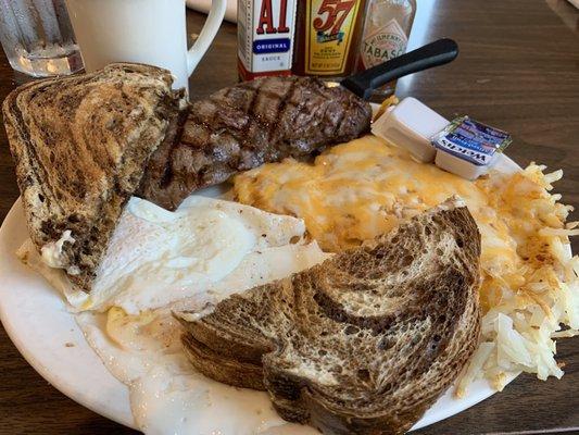 Sirloin and Eggs, cheesy hash browns and marble rye toast.