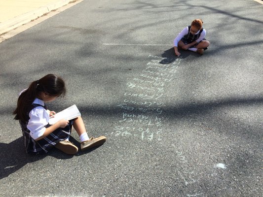 Preparing for an upcoming spelling test on an unseasonably warm February morning.