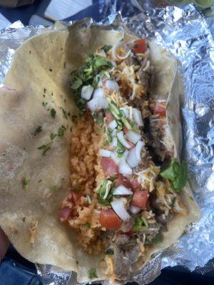 Fajita beef burrito. Comes with meat, rice, beans, and pico