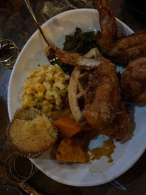 Fried chicken plate with corn bread muffin, greens, sweet potatoes, Mac n cheese w/a waffle