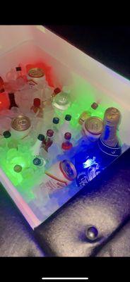 BUILT IN COOLER WITH MINI SHOTS, BEER, AND CHAMPAGNE