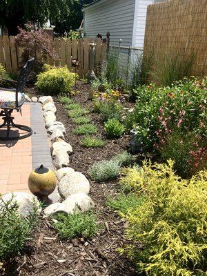 custom patio, perennial garden, and landscape lighting design and installation