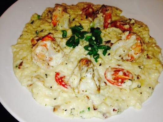 Succulent grilled shrimp with creamy grits of cheese/bacon/onions.