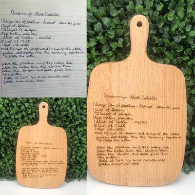 Handwritten recipes engraved on cutting board