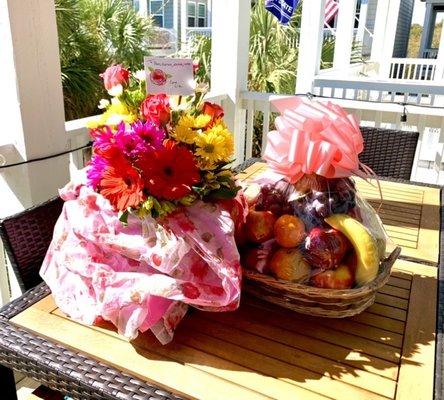 Large fruit basket and large beautiful flower arrangement!  Thank you Dan!