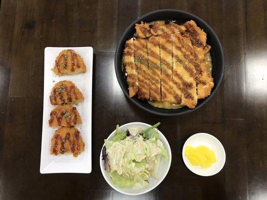 Katsu curry rice with a side of croquettes and a salad. Their dressing is homemade and delicious.