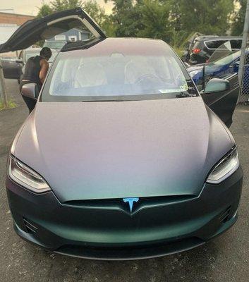 Color shift wrap on Tesla w/ chrome delete.