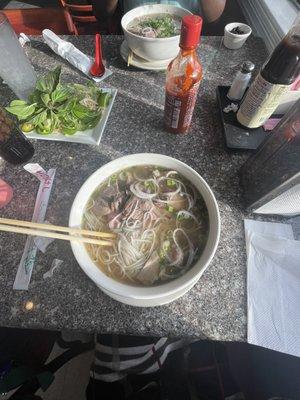 Two large beef pho soup