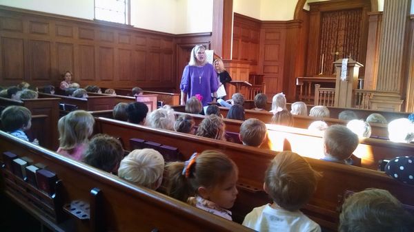 Preschool children attend chapel throughout the year singing songs, listening to stories and learning about outreach programs.