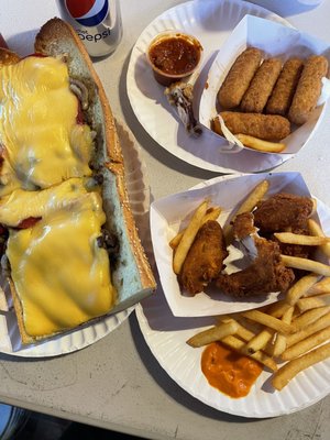 PHILLY CHEESE STEAK, mozzarella sticks, chicken wings