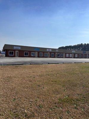 Carolina Pool & Repair is located on the corner of the Carolina Business Center Plaza