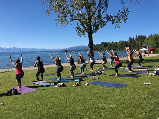 Chair pose on Lake Tahoe. Outdoor yoga Lake Tahoe at it's best.