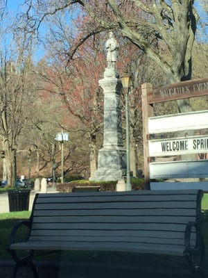 Statue to the left of the Church