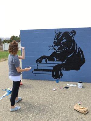 Lauren looking at the finished product of the Patterson Panther!