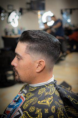 Drop fade with a slick back.